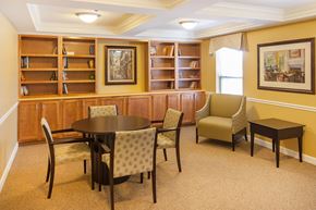 Whitehall apartment for rent - a dining room with a table and chairs and a library