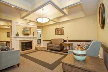 Whitehall apartment for rent - a living room with furniture and a fireplace