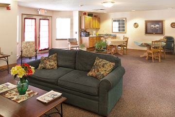Toledo apartment for rent - a living room and dining room with a couch and a table