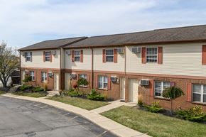 Dayton apartment for rent - a brick and with a sidewalk in front of it