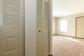 Dayton apartment for rent - an open door into a living room with a door to a closet