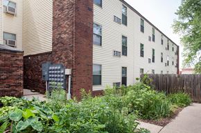 French Lick apartment for rent - a garden in front of an apartment building