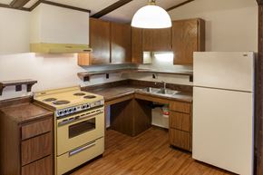 Paoli apartment for rent - a kitchen with a yellow stove and a refrigerator