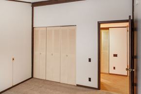 Paoli apartment for rent - a bedroom with white walls and a door to a closet
