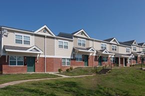 Cincinnati apartment for rent - an image of a row of houses on a hill