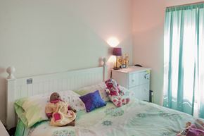 Cincinnati apartment for rent - a bedroom with a bed with stuffed animals on it