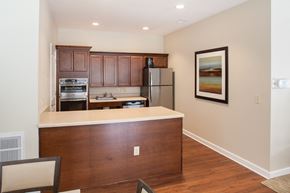 Independence apartment for rent - a kitchen with a counter top and a refrigerator