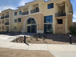 Phoenix apartment for rent - a large building with a walkway in front of it
