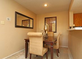 Arlington apartment for rent - a dining room with a table and chairs