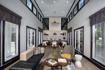 Indianapolis apartment for rent - a living room with a couch and a table with chairs