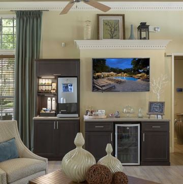 Longwood apartment for rent - a view of a living room with a tv and a bar