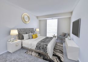 Fairfax apartment for rent - a bedroom with a bed and a tv