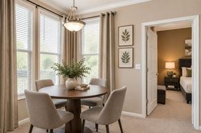 Sterling apartment for rent - A dining room with a round table and chairs.