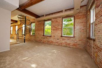 Exposed natural brick walls (riverwalk)