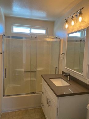 San Diego apartment for rent - a bathroom with a sink and a shower