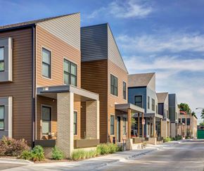 Grand Rapids apartment for rent - a row of townhouses on the side of a street