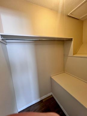Galloway apartment for rent - A white wall with a shelf and a mirror.